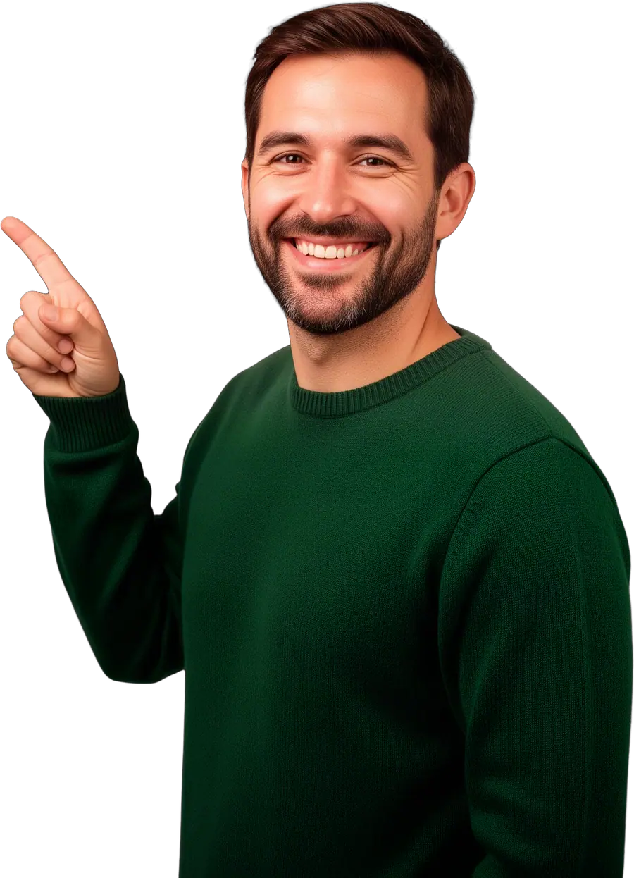 Smiling bearded man in dark green sweater pointing upward with one finger